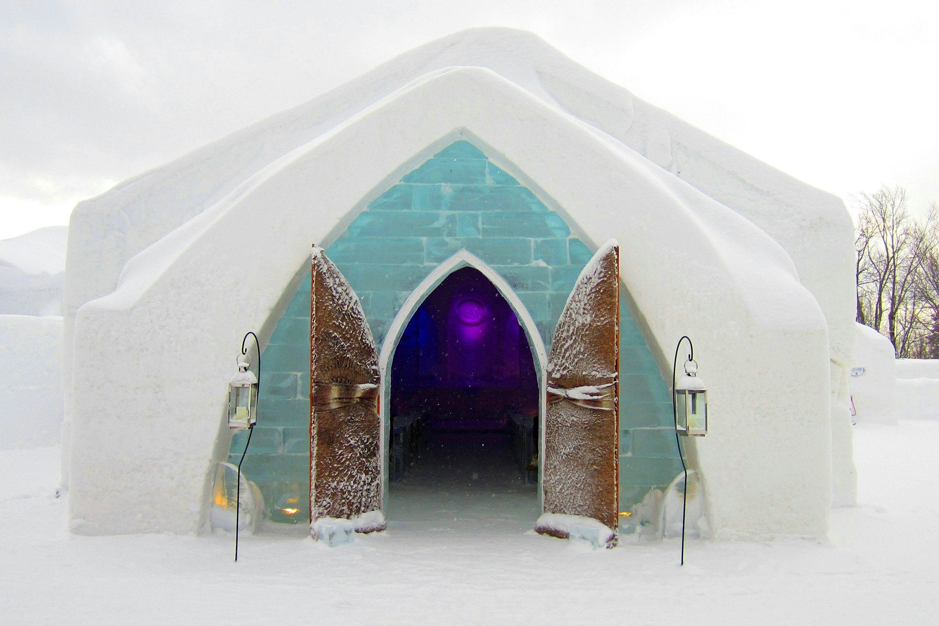 An igloo has its doors open in the Hotel de Glace