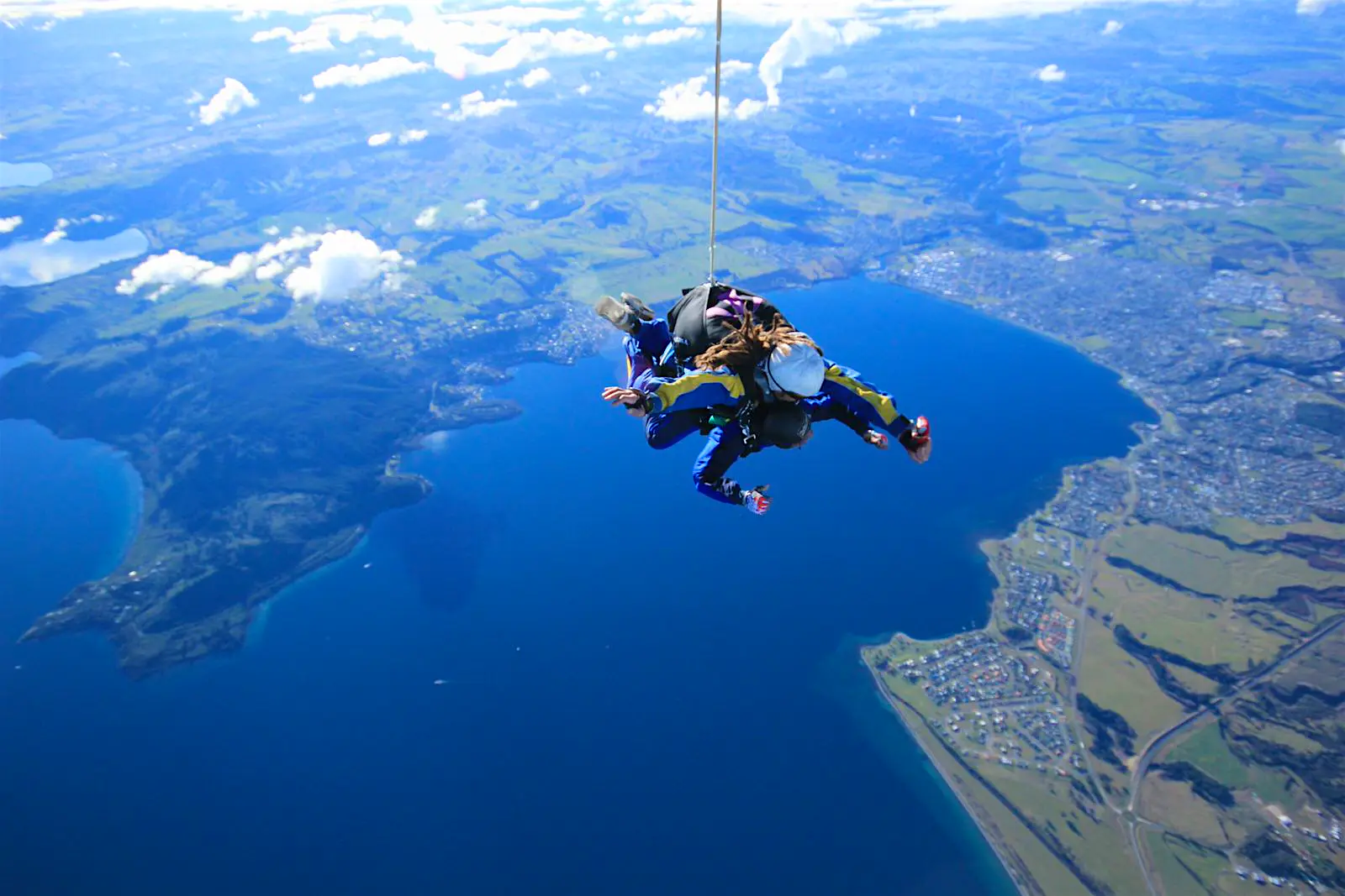 Features - shutterstockRF_696636874-62180e5ef4ee Tandem free fall sky diving at 15,000 feet above Lake Taupo