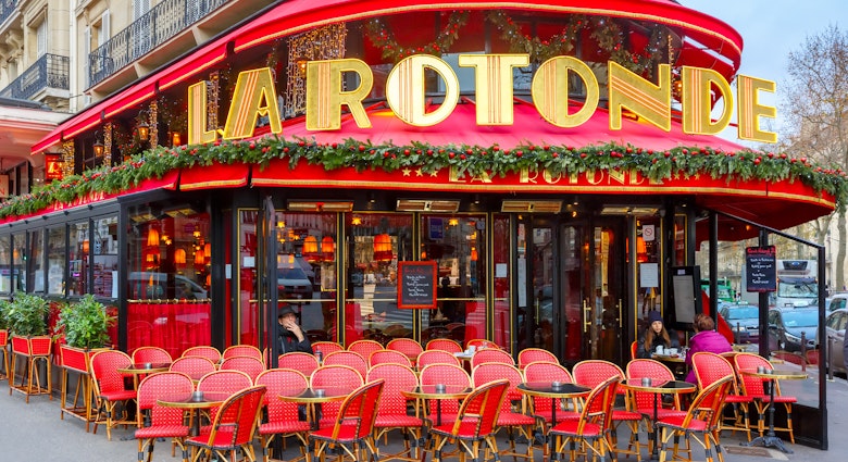 the red chairs and red marquee of La Rotonde.jpg