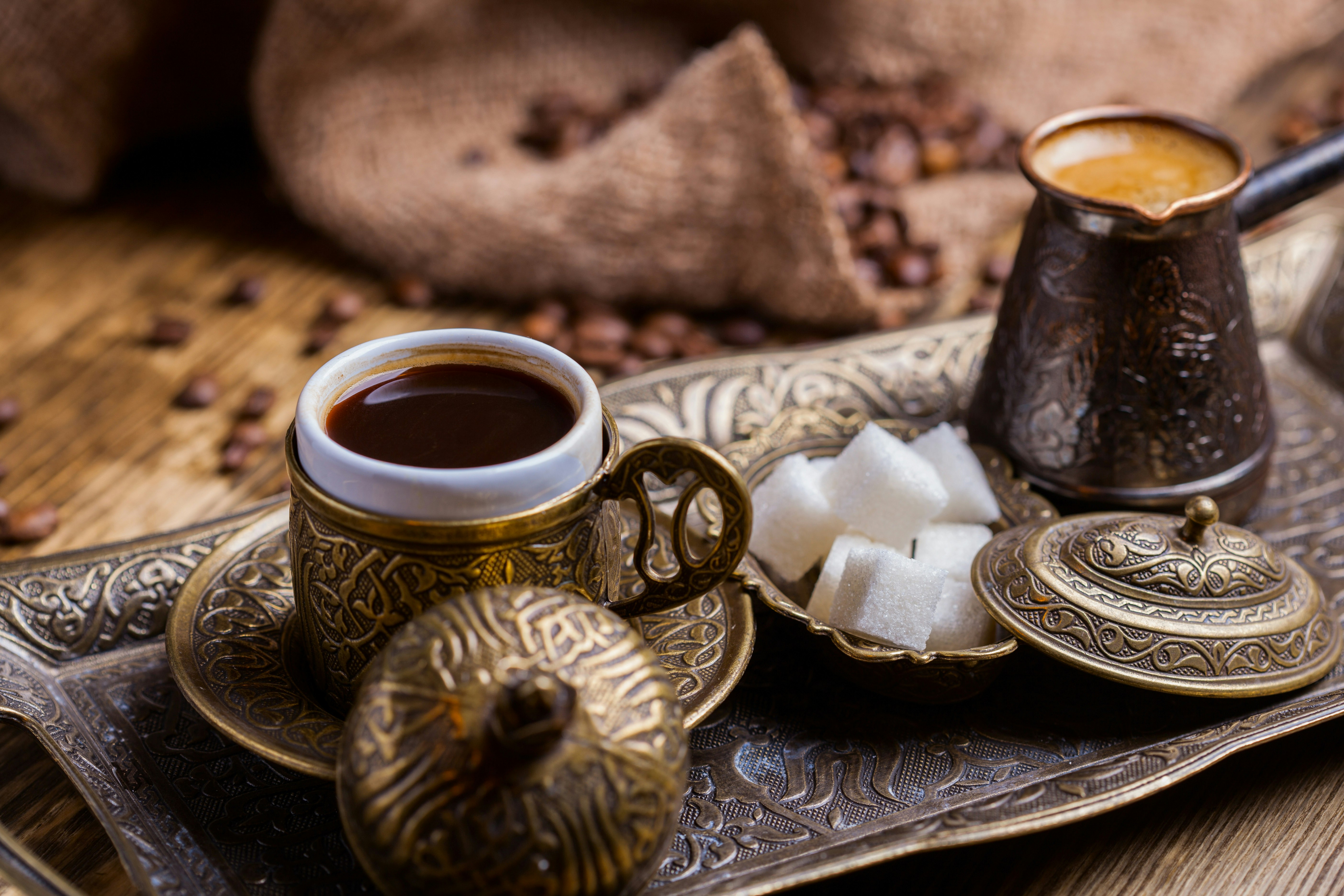 Turkish coffee served in ornate drinkware.