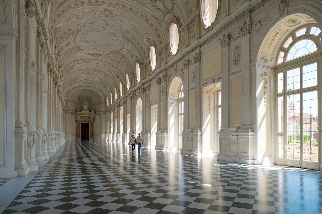 A picture of the Palace of Venaria's Great Gallery with lots of natural light coming in