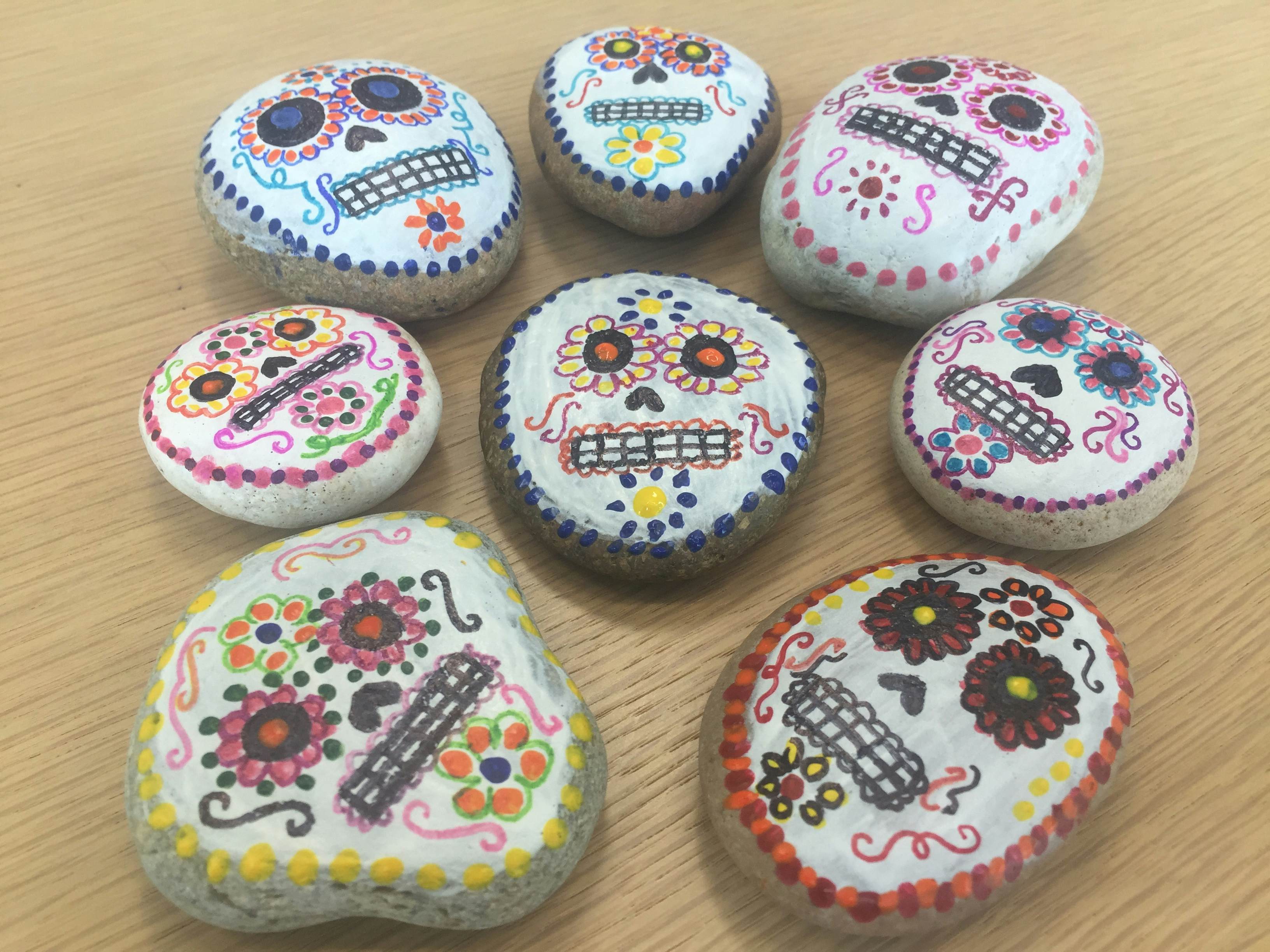 Rainy day activity: painting pebbles for Mexico's Day of the Dead