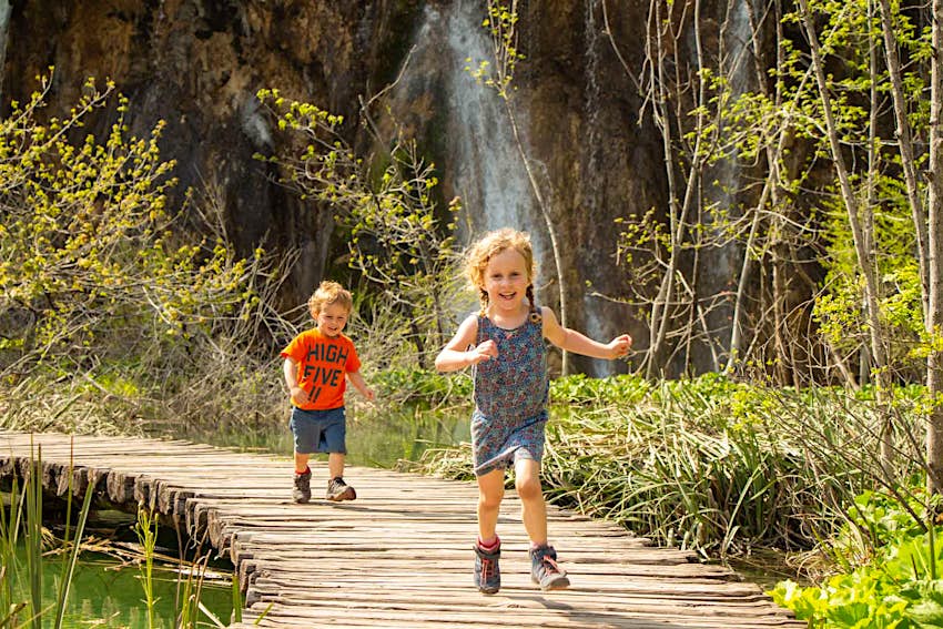 Kids Blog - Plitvice Lakes National Park with Kids-5 Two kids enjoying the boardwalks of the Plitvice Lakes © Celine Brewer