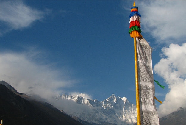 Prayer flag and Mount Everest in Nepal.