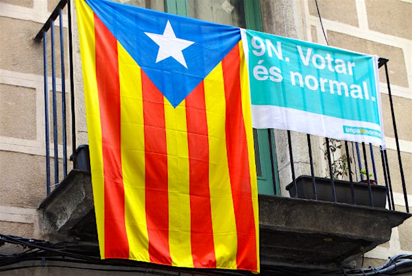 Travel News - Catalan flag Pro-independence Catalan flag and referendum poster.