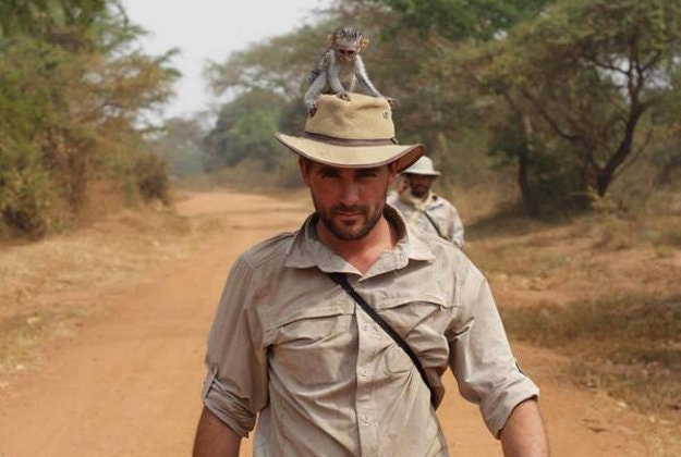 A little monkey hitches a ride with Levison Wood as he walks the Nile.