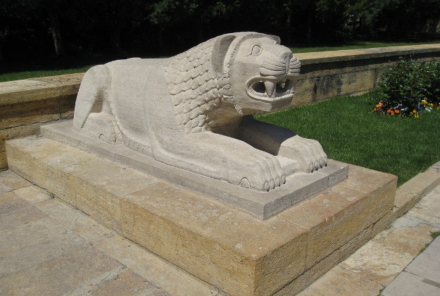 A lion sculpture carved in the Hittite style.