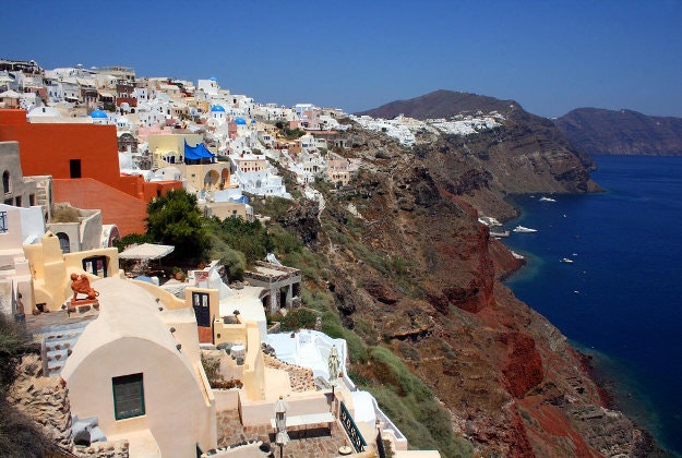 A cliff-side town on the on the island of Thira (Santorini), Greece.