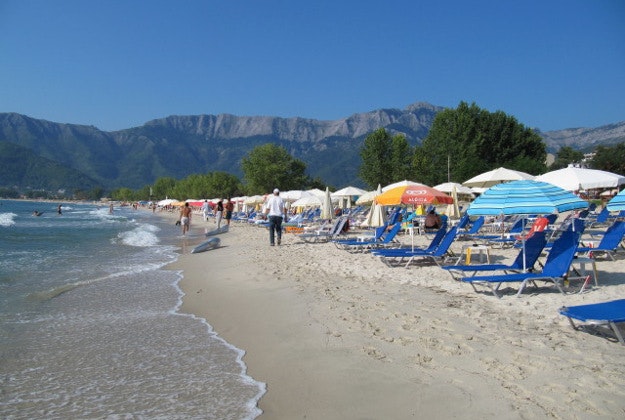 Sun loungers on Golden Beach, Thassos, Greece.