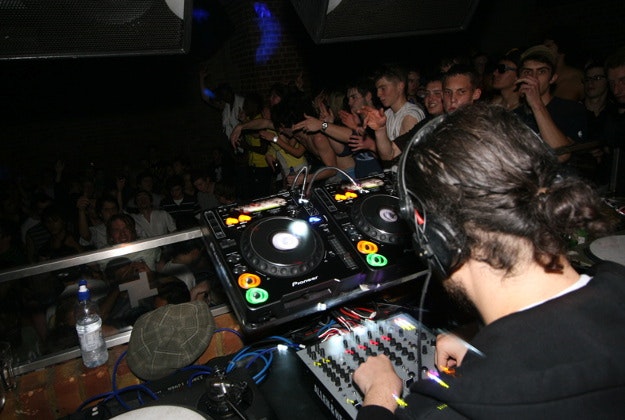 A DJ playing a set at Fabric nightclub, London.