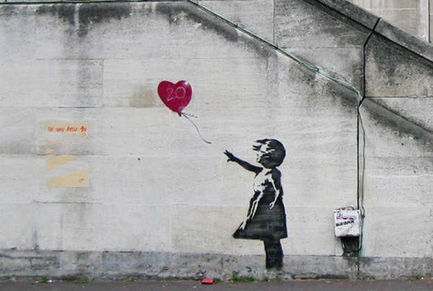 Banksy's girl and heart balloon.