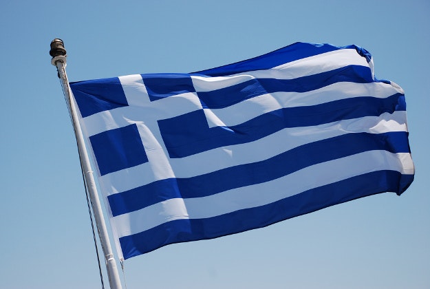 Greek government backtracks on decision to suspend football league.