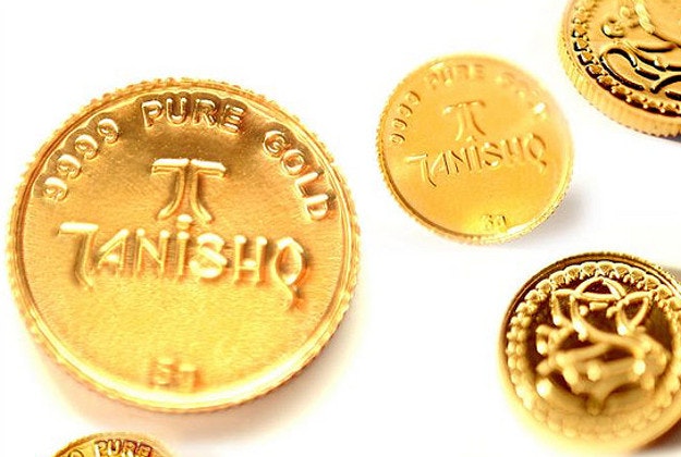 Gold coins made by the Tanishq jewelry company.