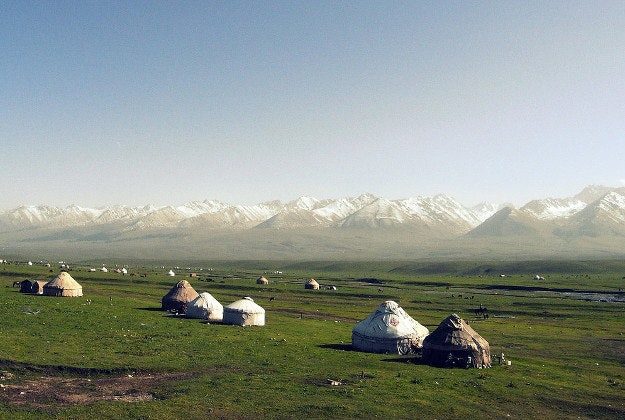 Farmlands and yurts in rural Xinjiang.