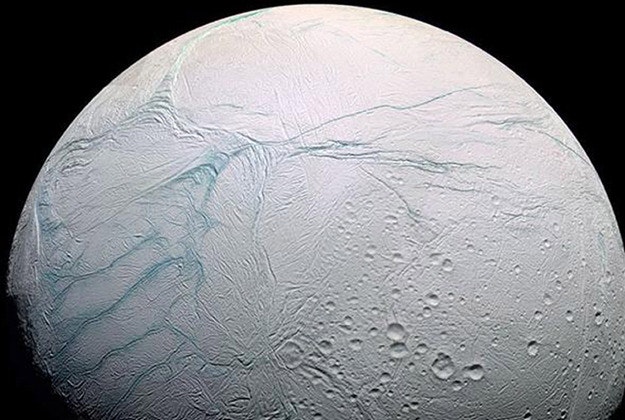 Nasa handout photo an artist's impression of one of Saturn's moon Enceladus.