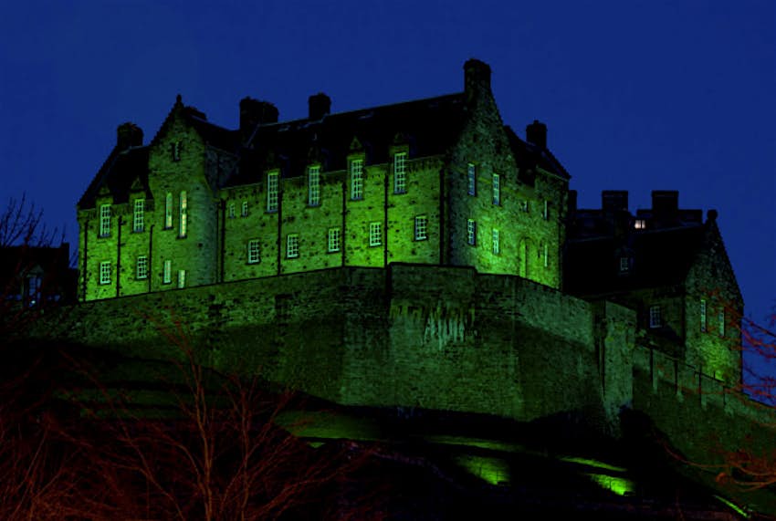 Travel News - St Patrick 2 Edinburgh Castle in Scotland illuminated green as it is among more than 100 international landmarks turning green to mark St Patrick's Day.