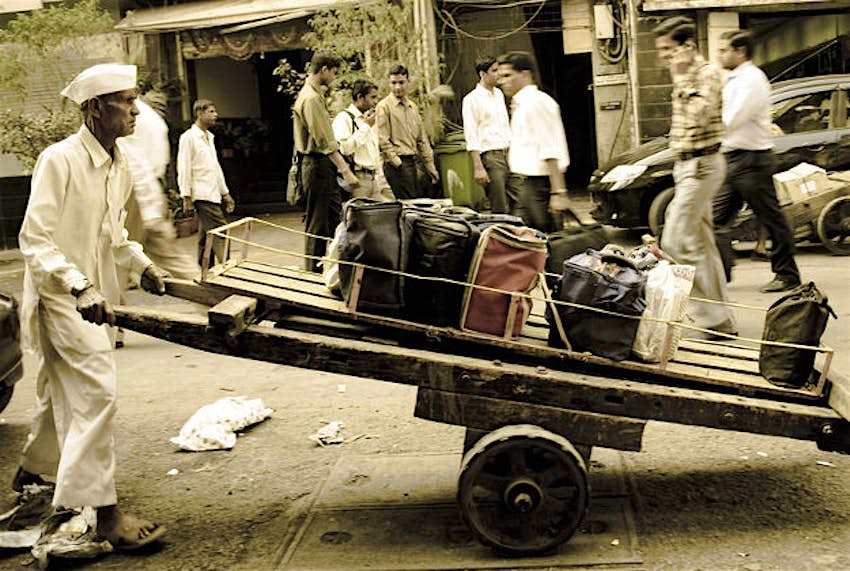 Travel News - dabbawallahs A dabbawallah in Mumbai.