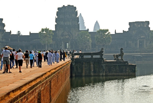 Visitors entering Angkor Wat.