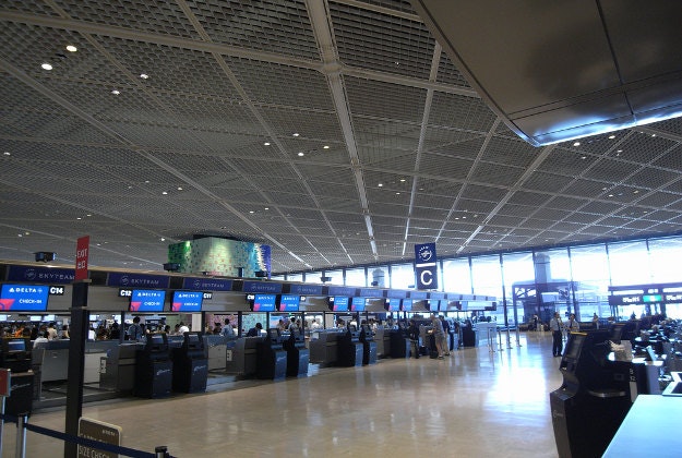 Check in at Tokyo's Narita International Airport.
