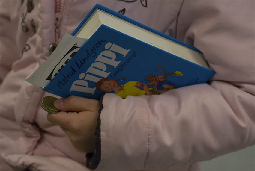 Travel News - Pippi Longstocking A young girl buys her first Pippi Longstocking book.