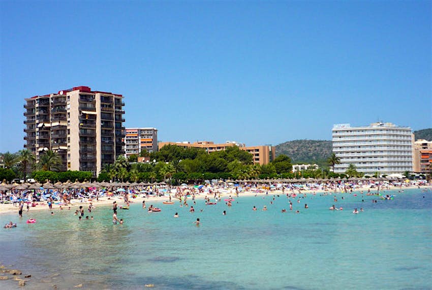Travel News - Magaluf A packed beach in Magaluf.