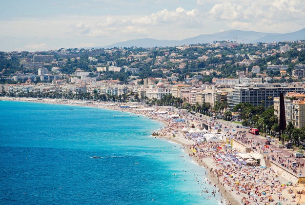 A busy beach in the French Riviera.