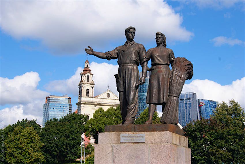 Travel News - Green bridge Soviet statue on the Green Bridge in Vilnius.