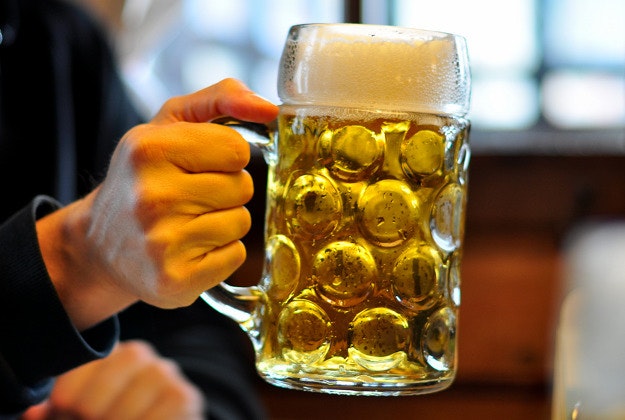 Raising a stein at Oktoberfest.