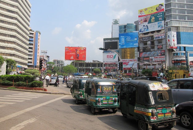 A row of taxi's in Dhaka.