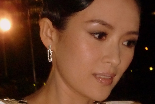 Chinese actress Zhang Ziyiwho has threatened legal action over her wax likeness in a tracksuit.