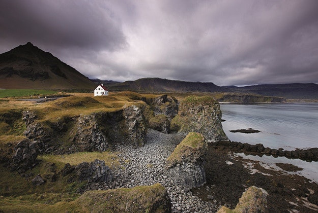 The fishing hamlet of Arnastapi in West Iceland attracts hikers to its beaches and nearby lava fields in summer.  