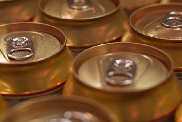 Man trades snake catching services for a six pack of beer.