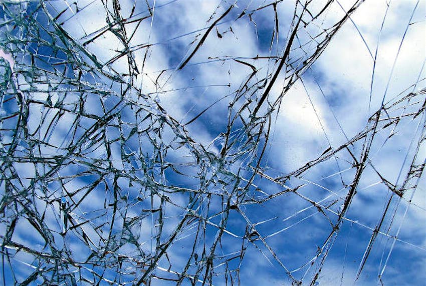 Travel News - Glass Cracked glass closes walkway.