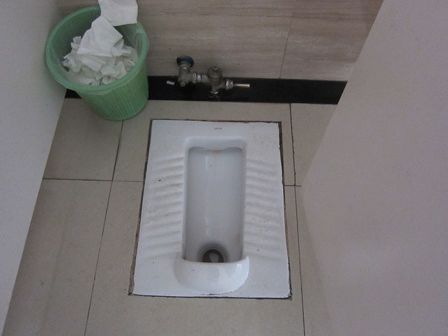 Squat toilet, China.