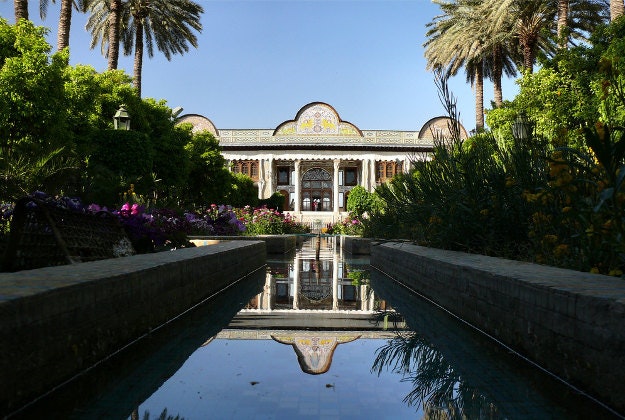 A garden and view of Qavam House in Shiraz, Iran. 