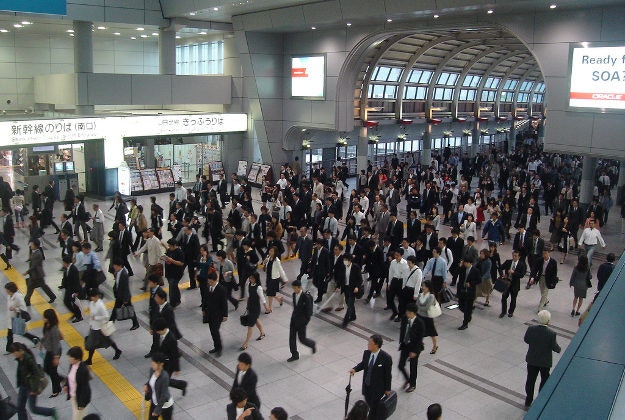 Commuters at Shinagawa station, Tokyo.