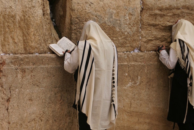 Praying at Jerusalem's Western Wall.