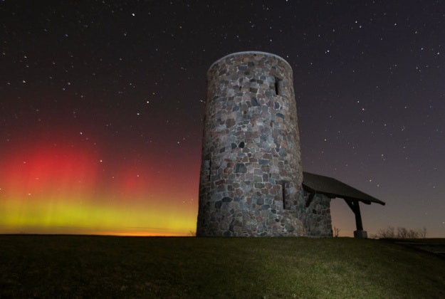 The Northern Lights shine over Pilot Knob State Park near Forest City, Iowa, in the early morning of Tuesday, 3 November.