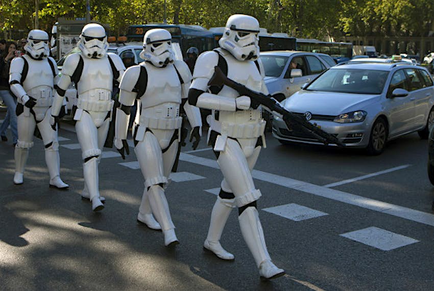 Travel News - photo1 Star Wars Storm Trooper characters cross the street after a giant Star Wars helmet was unveiled, during the inauguration of an open air exhibition called 'Face the Force' in Madrid, Spain, Friday, Oct. 30, 2015. Seven other giant helmets are due to be placed in various corners in the city.