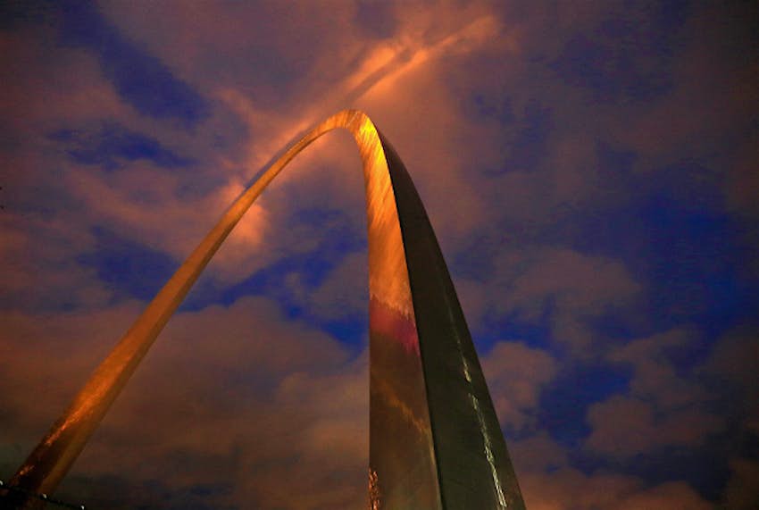 Travel News - photo3 The Gateway Arch is lit with golden-colored lights just before sunrise, Wednesday, 28 October, in St. Louis. The city is celebrating the moment when the final piece of the 630-foot-tall structure was put into place on 28 October, 1965.