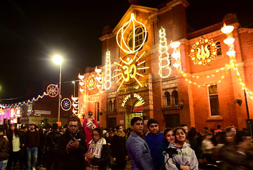 Travel News - photos12 People in front of the Belgrave Neighbourhood Centre during the lights switch on to celebrate the Hindu festival of Diwali, in Belgrave Road, Leicester.
