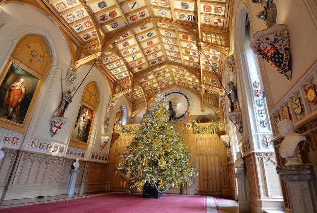 A 24 foot high Christmas tree stands in St George's Hall as part of Windsor Castle's Christmas display, as the State Apartments will be transformed with a festive Regency-themed display to show how the Prince Regent (the future George IV) celebrated Christmas at the Castle in the early-19th century. 