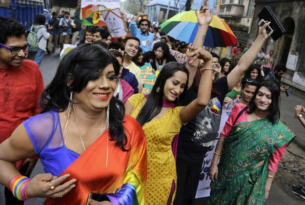 India's Lesbian, Gay, Bisexual and Transgender (LGBT) rights activists dance as they participate in the Rainbow Pride Walk in Kolkata, India, Sunday, Dec. 13, 2015. Over the past decade, homosexuals have gained a degree of acceptance in parts of deeply conservative India, especially in big cities. 