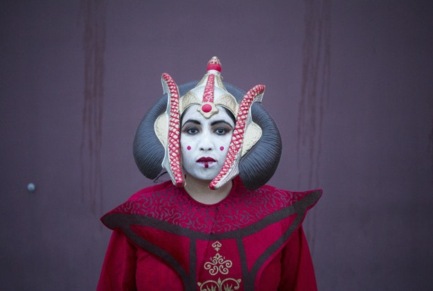 Victoria Castro, dressed as Star Wars character Queen Amidala, poses for a portrait before the first showing of "Star Wars: The Force Awakens" at Grand Cinemas in Sunnyside, Wash., Thursday, Dec. 17, 2015. 