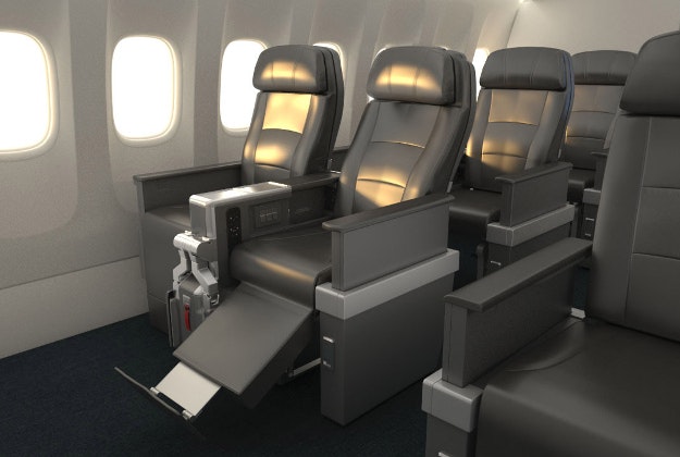 American Airlines Premium Economy seats with bulkhead footrest extended.