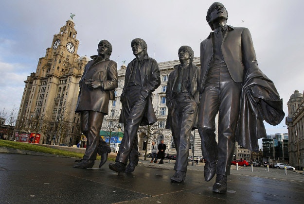 A new Statue of the Beatles is unveiled by John Lennon's sister Julia Baird outside the Liverbuilding, in Liverpool.