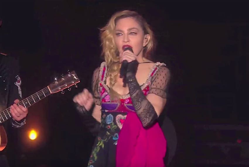 Travel News - madonna Madonna marked World AIDs Day during her concert in London