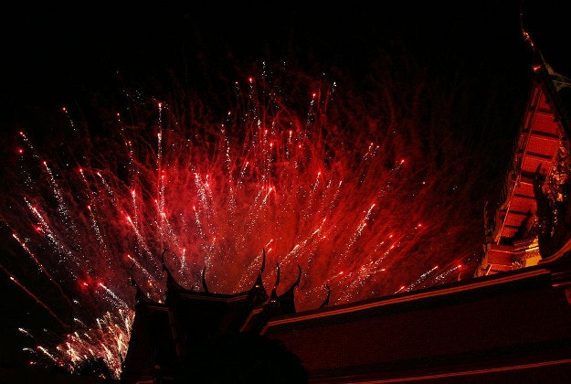 Fireworks celebrate the King's birthday in Thailand.