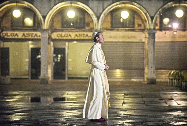 Actor Jude Law is seen on the set of Italian director Paolo Sorrentino's TV series "The Young Pope", in Venice's St. Mark's Square, Italy, early Thursday, Jan. 14, 2016. Law plays the part of a fictional Pope Pius XIII as the first American pope. 