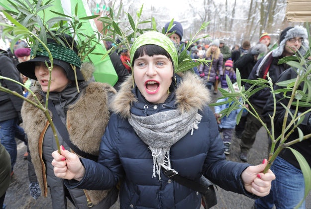 Protesters march to demand full protection of the Bialowieza Forest, in Warsaw, Poland, Sunday, Jan. 17, 2016. The new Polish government plans to increase the volume of tree cutting in the Bialowieza forest, which is considered the last primeval forest on the European plain. 